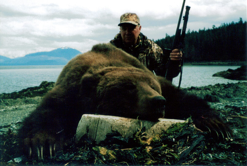 John Lee and his big brown bear.